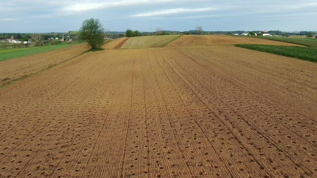 Amazing aerial pullback revealing shot, Lancaster County, PA farmland scene