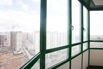 Modern glazed balcony in a Russian house