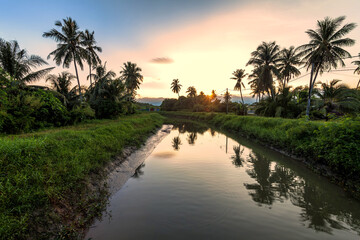 Village river reflection of sunrise view in Balik Pulau, Penang