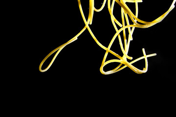 Close up of pasta on black background