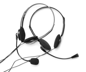 Modern headsets on white background