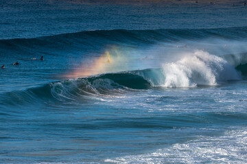 Rainbow over a breaking wave, Sydney Australia