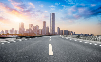 Fototapeta premium Urban road and urban architectural landscape