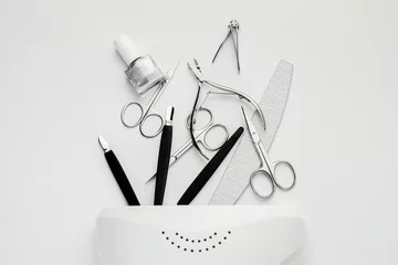 Fotobehang Supplies for manicure on white background © Pixel-Shot