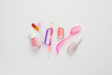 Supplies for manicure on white background