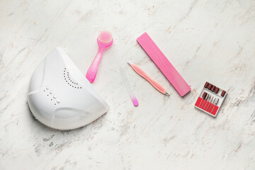 Supplies for manicure on white background