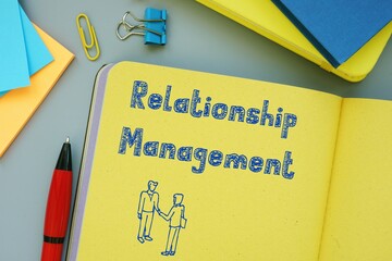 Financial concept about Relationship Management with phrase on the sheet.