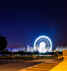 Ferris wheel in Paris at night, long exposure 