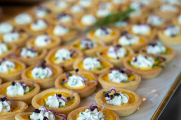 Bite sized pastries filled with sour cream