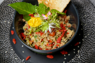 Healthy organic quinoa salad, Modern creative restaurant meal, exquisite dish, haute couture food	