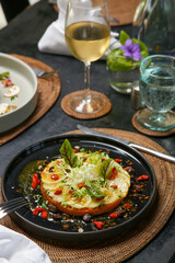 Exquisite dish. Beautifly decorated healthy organic food. Modern creative restaurant meal. Wite radish and carrot pulp decorated with salad leaves and goji berries.


