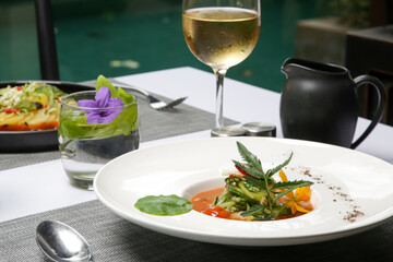 Healthy organic tomato soup. Modern creative restaurant meal. Exquisite dish, haute couture food.