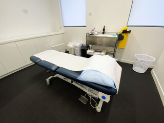 Doctors medical surgery with an examination bed and a trolley