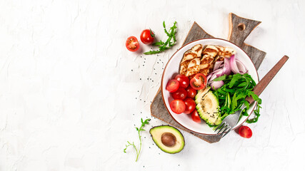 The concept of oriental cuisine. National Cyprus Salad with grilled Halloumi cheese, tomatoes, avocado, arugula on a light background, top view
