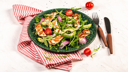 The concept of oriental cuisine. National Cyprus Salad with grilled Halloumi cheese, tomatoes, avocado, arugula. banner menu recipe place for text. Flat lay