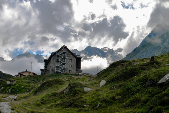 safehouse in the mountains under gloomy sky