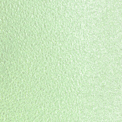 Fototapeta premium Green pastel foil paper texture background.