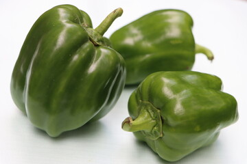Fresh green capsicum or bell pepper isolated