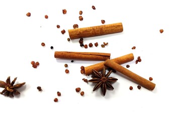 Cinnamon , Star anise , Pepper and other spices on white background