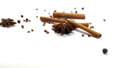 Cinnamon , Star anise , Pepper and other spices on white background