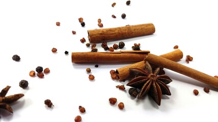 Cinnamon , Star anise , Pepper and other spices on white background