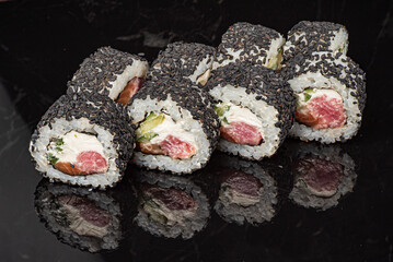 sushi on the black background