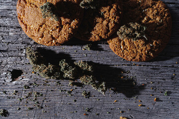 biscuits with hemp on an old wooden background close-up. rustic. Horizontal orientation.