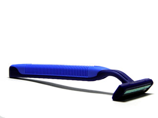 Disposable blue shaving machine on a white background