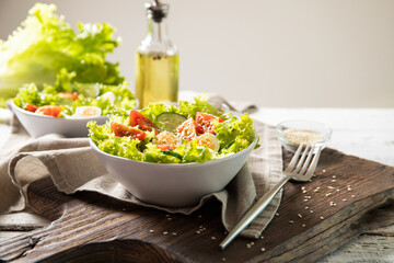 Tasty salad of fresh vegetables with quail eggs. Diet concept