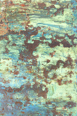 Fototapeta na wymiar metal rusty sheet with peeling paint