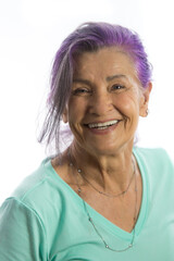 Portrait of beautiful mature whie woman with dyed hair style smiling with joyful and charming on white background isolate. Close up happy and cheerful older lady green shirt health care concept - 354509894
