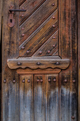 Old wooden door in the Ukrainian house.