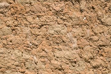 Old clay plaster on wall closeup