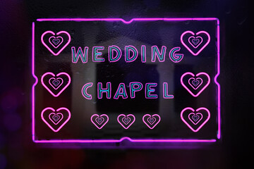 Neon Wedding Chapel Sign in Rainy Window Photo Composite
