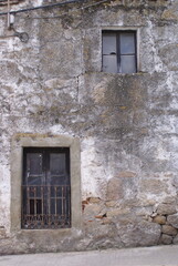 Ancient window break wall old Spanish Salamanca city 