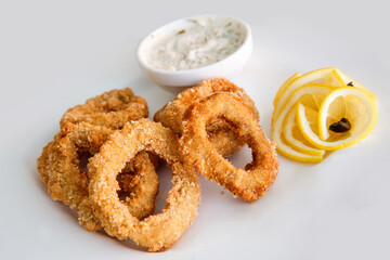 golden crispy Onion rings coated with breadcrumbs and deep fried