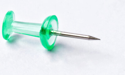 a lot of colorful pushpin close up on white background.