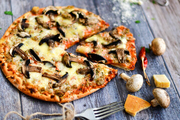  Home made italian pizza with mushrooms and parmesan  cheese