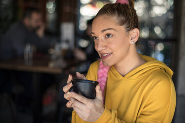 Makes a moment for coffee.