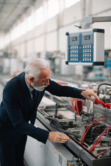 Manager checks machines at the factory. Inspector checks a factory.	