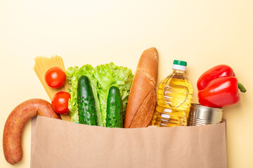 Paper bag of minimum grocery set. Delivery service during quarantine, coronavirus covid-19. Top...
