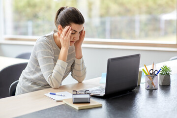 remote job, business and people concept - stressed or tired young woman with laptop computer working at home office