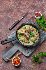 Beef liver stewed in sour cream.