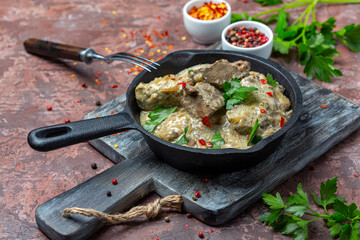 Liver in sour cream sauce. Dish of Russian cuisine.