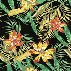 Beautiful fiery color exotic tropical flowers lotus, lily and green, golden color palm, banana, fern leaves seamless vector pattern on black background. Beach summer trendy illustration.
