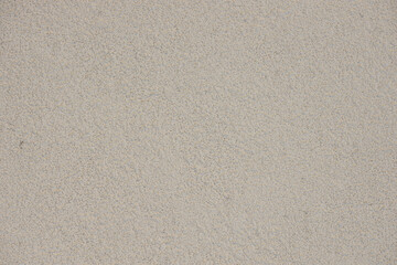 Abstract of white grainy wall from decorative pargeting material plaster, close-up. Architecture facade design.