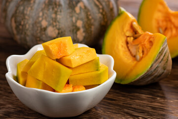 A Bowl Of The Pumpkin Dice On The Wood Table