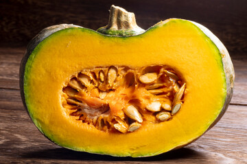 Half Pumpkin On The Wood Table