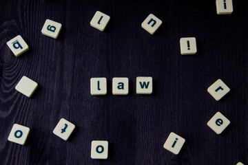 Word or phrase LAW made with  letters on the wood, great image for your design.
