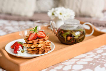 Delicious fresh baked belgian waffles with berries and fruit